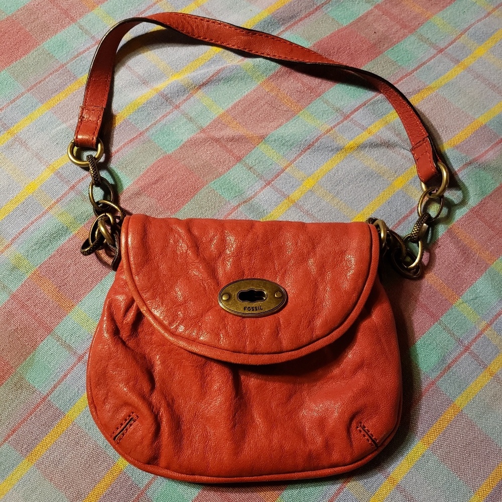 Red Fossil genuine leather purse.